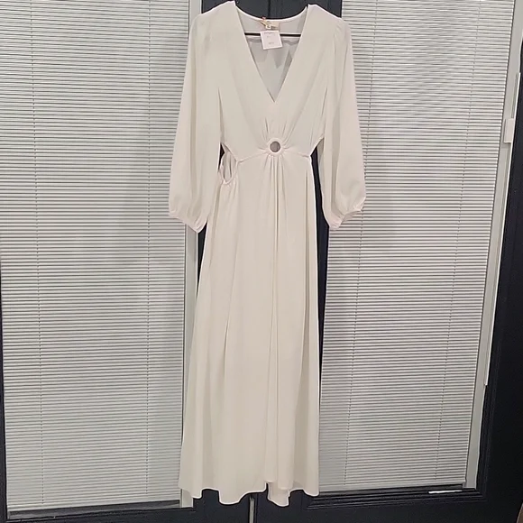 sexy seasonal dress with sides cutout. v-neck with a little stomach exposure - Picture 1 of 2